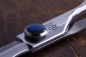 Preview: Haarschere  ,Mitzaki-Shiro 600, 6.0" ZOLL,440C Japanstahl, Hohl geschliffen, ergonomische Formgebung, Schneiden mit Semikonvexschliff, fester Fingerhaken - Rändelschraube mit safirblauem Schmucksteinbe